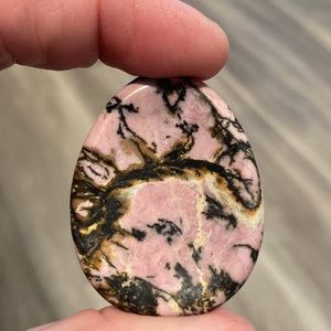 15. Rhodonite Worry Stone 22 Grams